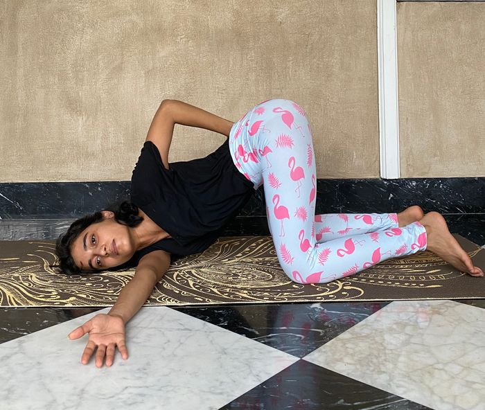 Parsva Balasana International Day Of Yoga With Mrinalika Bhanjdeo featured in currentMood magazine